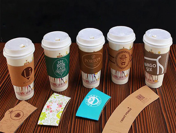 https://customdesignsboxes.com/images/coffee-cup-sleeves.webp